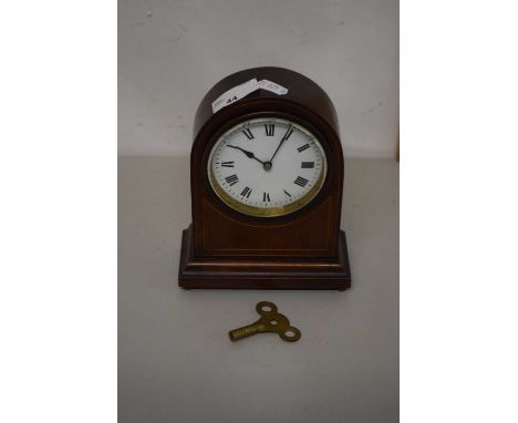 Edwardian mahogany cased dome topped mantel clock fitted french brass movement.Stamped BTG to the base