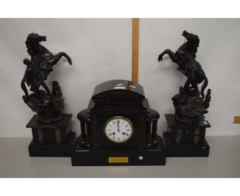 Black slate mantel clock together with a pair of accompanying bronzed Spelter Marley horse figures with non matching bases to