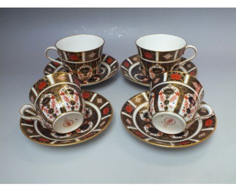 TWO ROYAL CROWN DERBY BREAKFAST CUPS AND SAUCERS IMARI PATTERN No. 1128, together with two Royal Crown Derby tea cups and sau
