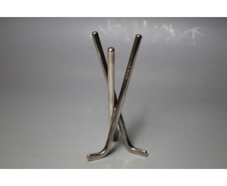 A HALLMARKED SILVER HOCKEY STICK STAND BY WILLIAM ADAMS LTD - BIRMINGHAM 1983, formed of three hockey sticks, approx weight 1