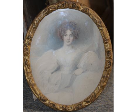 A 19TH CENTURY OVAL PORTRAIT STUDY OF AN ELEGANT YOUNG WOMAN HOLDING A SHEET OF MUSIC, unsigned, watercolour, framed and glaz