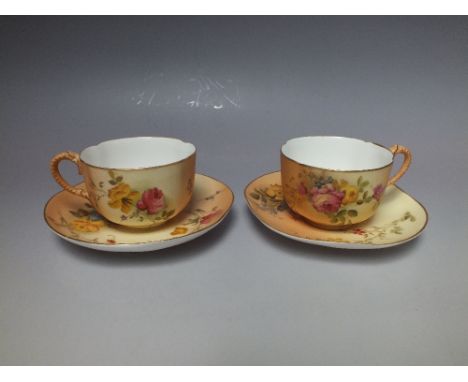 TWO ROYAL WORCESTER BLUSH IVORY CUPS AND SAUCERS, date marks for 1908 apart from one cup being 1903, saucer Dia.13 cm