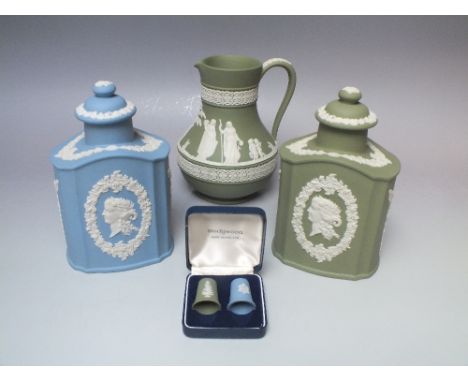 TWO WEDGWOOD JASPERWARE TEA CANISTERS, comprised of a light blue and a sage green example, H 16 cm, together with a sage gree