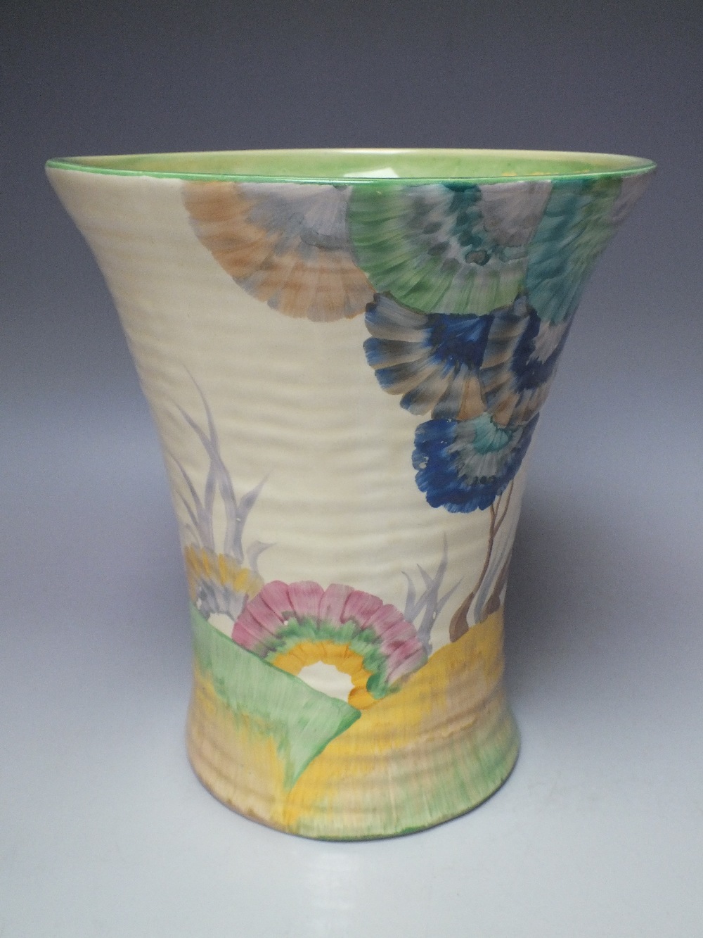 A LARGE WILKINSON POTTERY VASE FROM THE BIZARRE RANGE BY CLARICE CLIFF