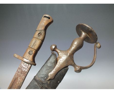 A MIDDLE EASTERN CURVED SWORD, with shaped metal grip, overall L 86.5 cm, complete with scabbard, together with a single full