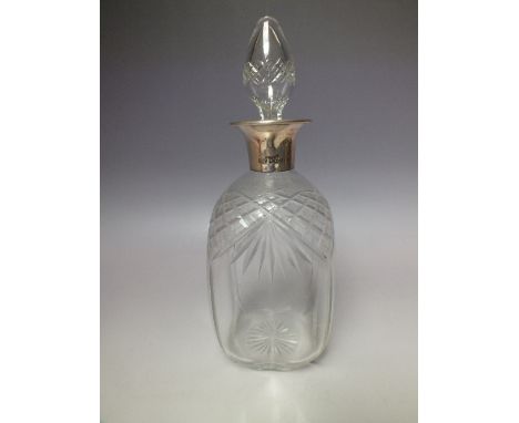 A HALLMARKED SILVER COLLARED GLASS DECANTER - SHEFFIELD 1951, overall H 27 cm