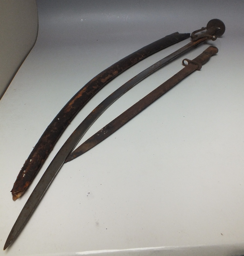 A MIDDLE EASTERN CURVED SWORD, with shaped metal grip, overall L 86.5 ...