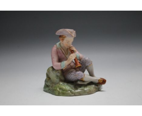 A ROYAL WORCESTER FIGURE OF A BOY PLAYING CORNET, sat on a naturalistic base, wearing a tricorn hat, backstamp to base, H 9.5