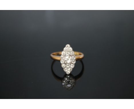 AN 18CT YELLOW GOLD MARQUISE SHAPED DIAMOND CLUSTER RING,  set with old cut diamonds totalling approx 1 carat, ring size T 1/