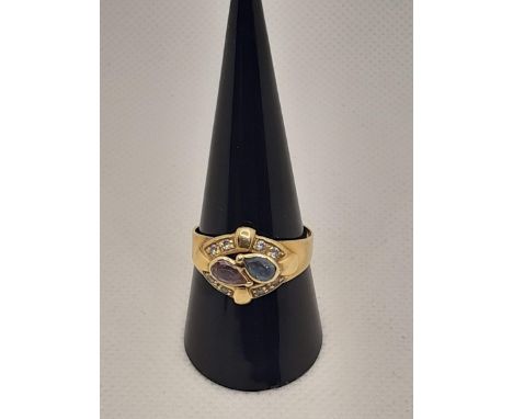18 CARAT YELLOW GOLD RING WITH COLORED ZIRCONI. MEASURE 20 - 4.5 GRAMS - AU 86