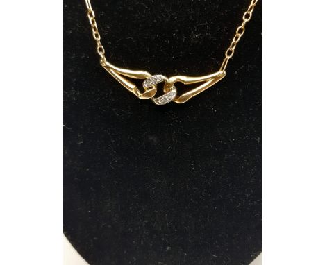 18-CARAT YELLOW GOLD CHAIN WITH CENTRAL BOW INSERT AND 4 LIGHT POINT GLITTERS - LENGTH CM. 45 - WEIGHT 6.2 GRAMS - AU 85