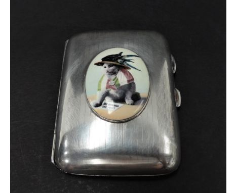 Of suffragette interest - a George V silver engine turned cigarette case, the lid inset with an oval photographic enamel pane