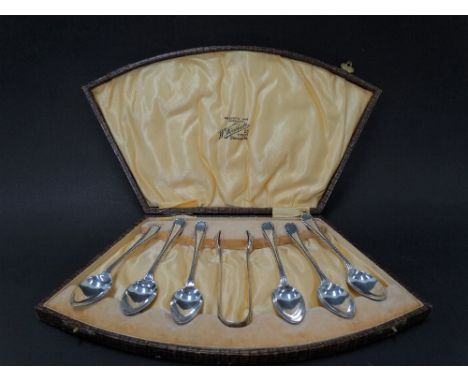 A George V silver set of six teaspoons and sugar tongs within fitted case by W.H. Haseler, Birmingham 1925, weight 3.65oz app