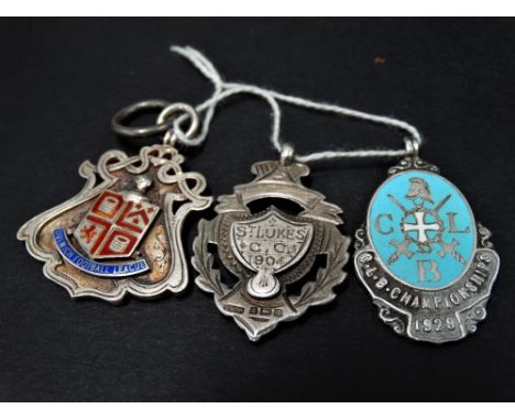 A silver and enamel 'Dulwich Football League' shield fob, together with two other shield fobs. 