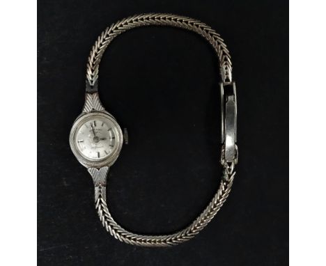 A ladies 9ct. gold manual wind bracelet wristwatch by Rotary, the 12mm silvered dial with baton markers, with twenty one jewe