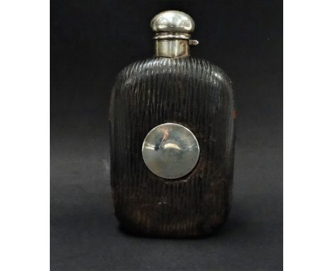 An unusual American sterling silver leather covered glass hip flask, with screw lid, the body with a hidden cup, the rim stam