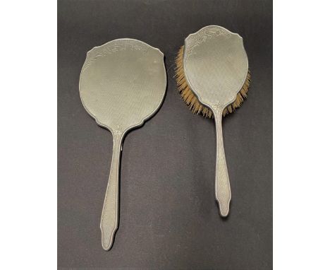 A modern engine turned silver hair brush and dressing table mirror with foliate engraved design by Walker &amp; Hall, Birming
