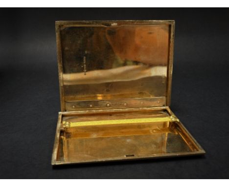 A good George V 9ct. hallmarked engine turned gold cigarette case by Asprey's, London, with slide action hinge, London 1927, 
