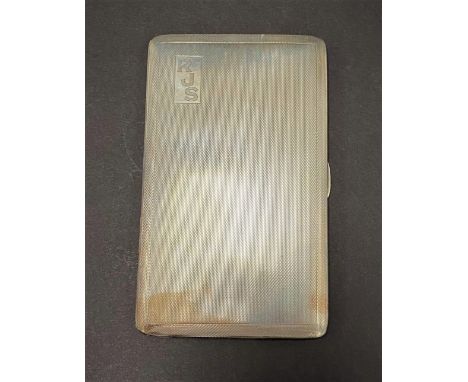 A George VI silver engine turned cigarette case with engraved monogram to the lid, the interior with engraved dedication, mak