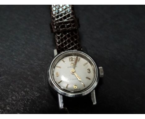 An Omega Ladymatic manual wind wristwatch in stainless steel case, the 14mm cream dial with gilt baton and quarter Arabic num