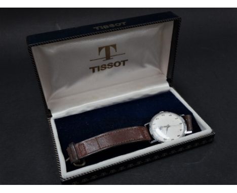A Tissot gentlemans manual wind wristwatch within steel case and original box, the 28mm white dial with Arabic numeral signed