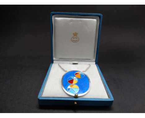 A good Danish silver and coloured enamel pendant necklace designed by Per Arnoldi for Anton Michelsen, of oval shape set with