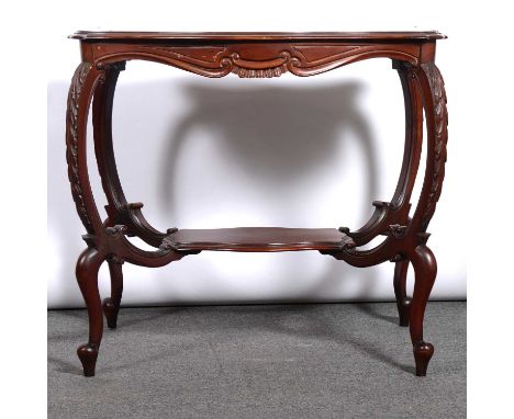 Edwardian mahogany occasional table, serpentine top, carved scrolled legs joined by a shelf, 82x56cm, height 72cm.