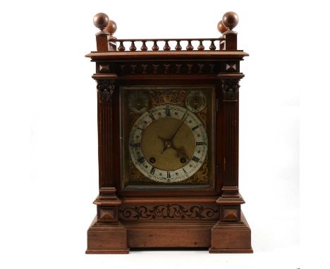 Walnut bracket clock, the case with spindle gallery and Corinthian half columns, square brass dial, Winterhalder &amp; Hofmei