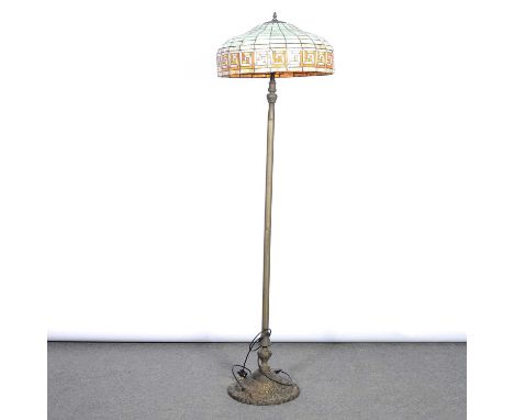 Modern standard lamp with leaded glass shade, orange and green geometric design, overall height 168cm.
