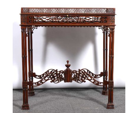 Chippendale style mahogany silver table, rectangular top with pierced gallery, candle slide, cluster column legs joined by a 