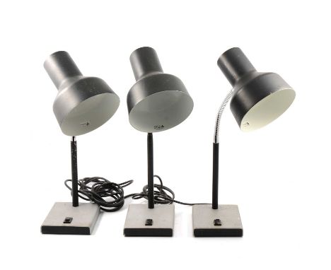 Three Anglepoise Lighting Ltd desk lamps, model 99, black shades on silvered metal bases.