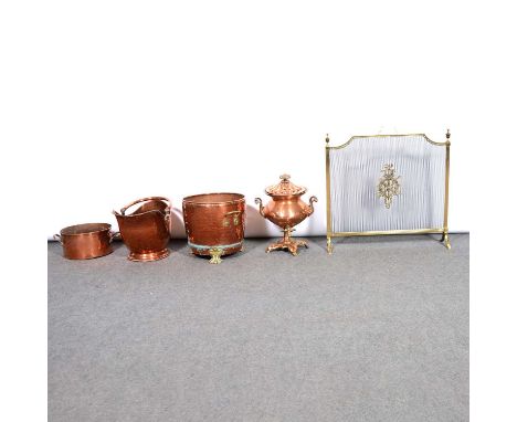 Copper helmet-shape coal scuttle; copper bucket raised on brass lion claw feet, copper jam pan, brass mesh firescreen, samova