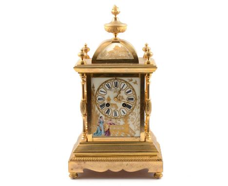 French brass mantel clock, the case with urn finial and enamelled glass panels, the dial signed Goldsmith's Alliance, London,