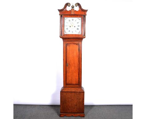 Oak and mahogany longcase clock, swan neck pediment with brass finial, fluted columns, long arched door, bracket feet, 12" sq