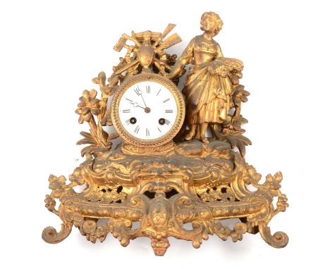 French gilt spelter mantel clock, the case surmounted with a young harvester, circular dial, cylinder movmennt striking on a 