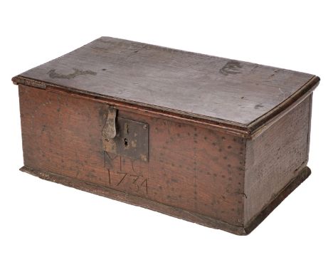 Bible Box. An Oak Bible box or desk box, with relief carving to front bearing initials M.C. and dated 1734, with original hin