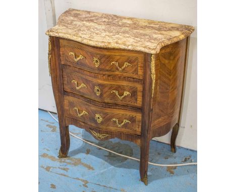 PETITE COMMODE, early 20th century, French tulipwood, the serpentine marble top over three drawers with parquetry detail and 