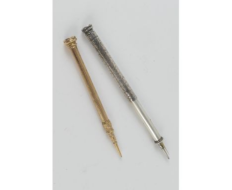 Sampson Mordan &amp; Co. silver propelling pen and pencil, with hardstone terminal; also a gold coloured engine turned propel