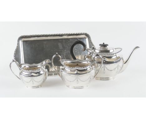 George V silver three piece tea service on a presentations tray, Sheffield 1929, comprising teapot with ebony finial and hand