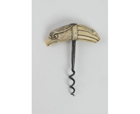 Scrimshawed marine ivory steel corkscrew, inscribed 'Bark Peru, Nantucket' and carved as an eagle's head, 11.5cm x 8.5cm(The 