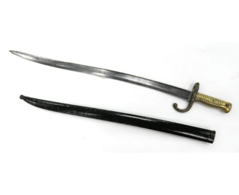 French chassepot bayonet, single edged double fullered blade inscribed 'St Etienne, Juin 1874', with reeded brass hilt and me