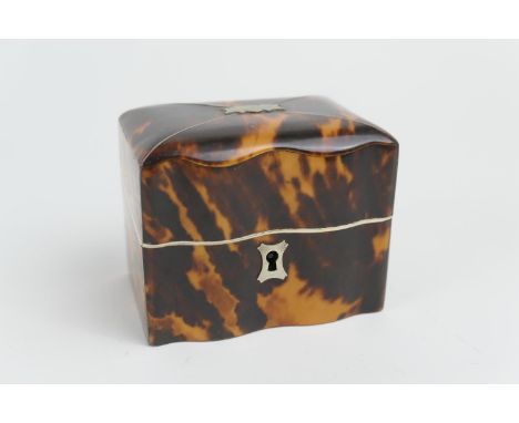 Tortoiseshell small jewellery casket (converted tea caddy), early 19th Century, rectangular form with serpentine front, pewte