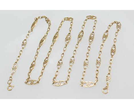 Yellow metal wirework open and chain link necklace, unmarked, testing as 18ct, with 18ct gold bolt ring clasp, probably Egypt