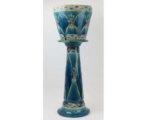 Minton Secessionist jardiniere on stand, circa 1915, the sea green ground dispersed with stylised flowerheads and foliage in 