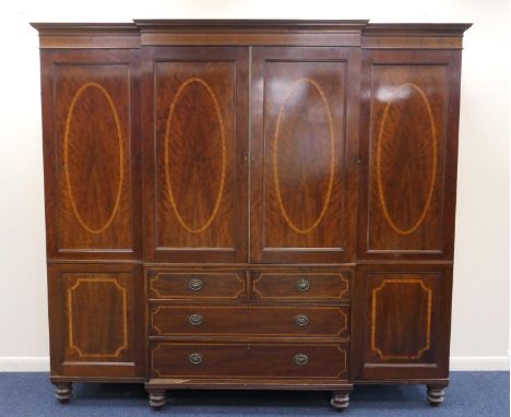 Late Victorian mahogany and satinwood inlaid breakfront press robe, the centre with two recessed panel satinwood banded doors