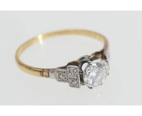 Diamond solitaire ring, the central round cut diamond of approx. 0.5ct, illusion set, colour estimated as L/M, in a platinum 