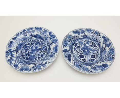 Pair of Chinese blue and white dishes, Kangxi (1662-1722), wrythen moulded borders detailed with a monkey seated in a tree, a