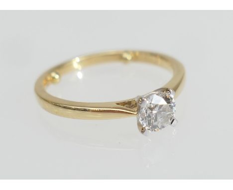 Diamond solitaire ring, brilliant cut stone of approx. 0.5ct, in a platinum four claw mount, on an 18ct yellow gold ring with