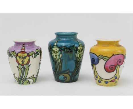Three Mintons Secessionist small vases, circa 1900, one having a yellow ground and decorated with stylised ruyi lappets, prin