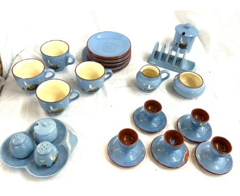 Selection of sandygate seagull ware pottery includes cups, saucers, egg cups etc 